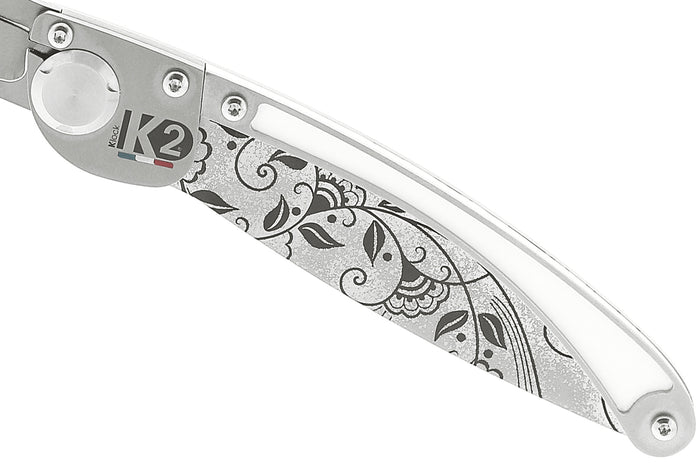 Couteau pliant K2 Elegance K2.20M manche inox décor arabesque 11,5cm + étui suédine