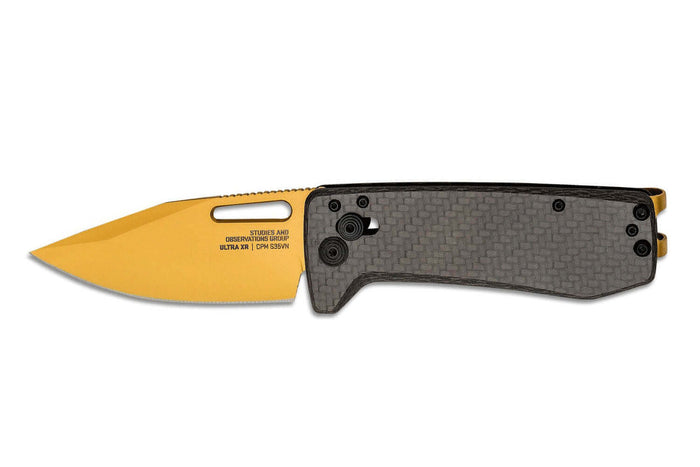 Couteau pliant SOG Ultra XR Gold SGULTRAXRGD manche en fibre de carbone noir 9,1cm