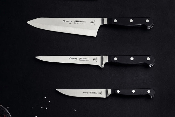 Couteau santoku Tramontina Century Rocking lame forgée 18cm manche polycarbonate noir