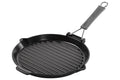 Gril rond Staub 28cm en fonte émaillée noir mat à poignée pliable