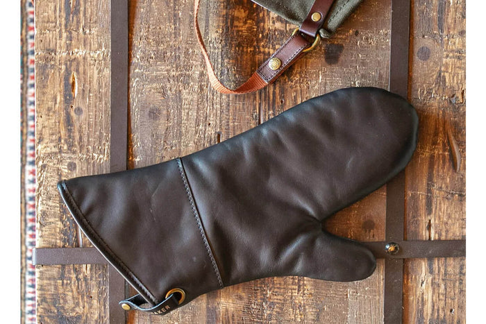 Manique Alaskan Maker Defender noir et orange en cuir