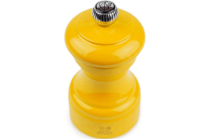 Moulin à poivre manuel Peugeot Bistro en bois de hêtre laqué jaune safran 10cm