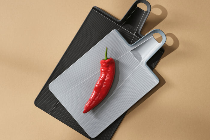 Planche à découper pliable Joseph Joseph Chop2Pot Plus grand modèle noir 34,5x26cm