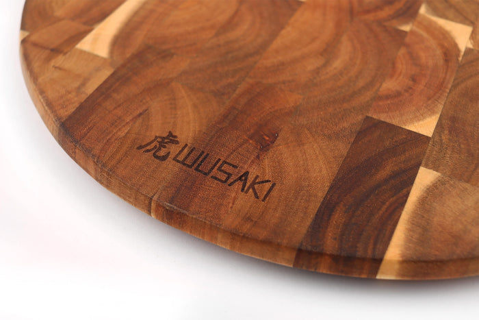 Planche à découper Wusaki ronde en acacia 42,5 x 32 x 1,8cm