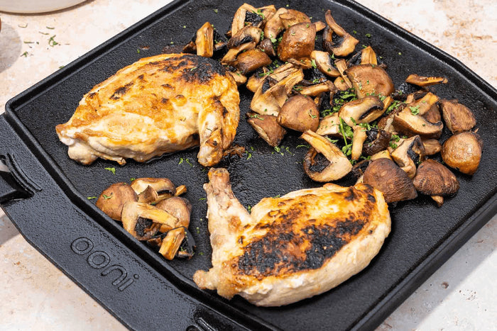Poêle à griller Ooni double face en fonte manches amovibles + dessous-de-plat inox