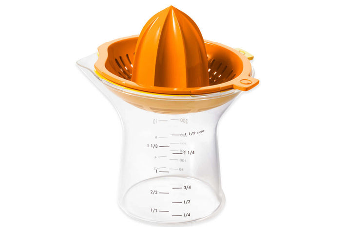 Presse agrumes OXO citron et orange avec récipient doseur