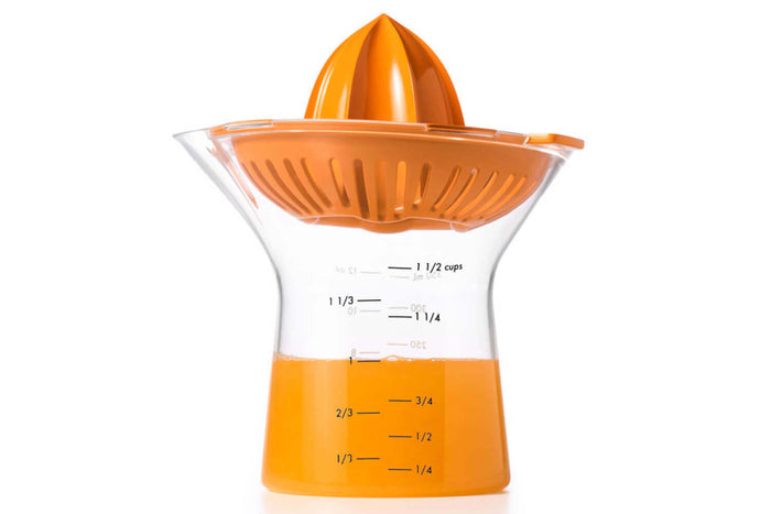 Presse agrumes OXO citron et orange avec récipient doseur