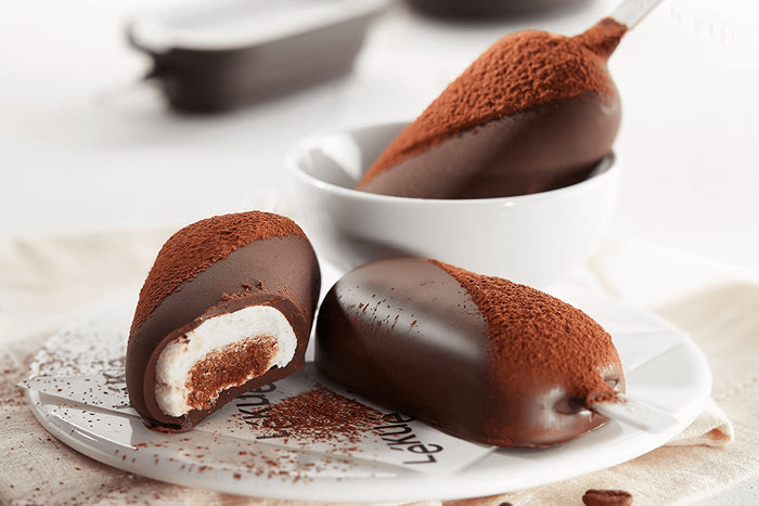 Set de 4 moules à glace Lékué Classic Creamy + pot en silicone noir
